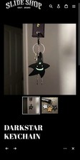 Slideshop keychain dark star brand new picture