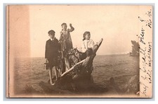 RPPC Lake Superior Children on Driftwood w Toys Ontonagon Michigan. picture