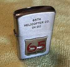 Vintage Vulcan Lighter Advertising 65th Helicopter Co. (H-21) Shawnee Braves picture