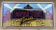 Vintage Universal Studios Florida Metal License Plate Still Sealed Brand NEW picture