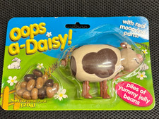 Vintage Oops A Daisy Jelly Bean Dispenser Cow Leaving Piles of Yummy Jelly Beans picture