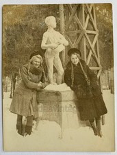 Two pretty girls Long hair Braids Beautiful face Pioneer Sculpture Russian photo picture