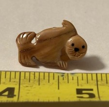 CASSIAR MOUNTAIN BRITISH COLUMBIA CANADA HAND CARVED SEAL PIN BACK picture