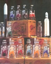 12 GALAXY SPACE FOODS  SPACEMAN   ASTRONAUT SODA SYRUP  BOTTLE COIN BANKS 1953 picture