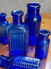 Lot of 5 Cobalt Blue Glass Bottles, 1 Embossed
