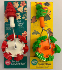 Vintage Wilton Santa and Dinosaur Cookie Wheel Holiday Rolling Cookie Cutters picture
