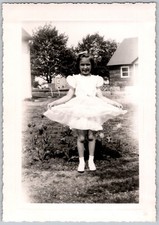 Vtg B&W Snapshot Smiling Little Girl Pretty White Ruffled Dress Yard 1950s picture