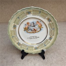 Antique H. A. & D. W. Nickles 1910 Hays Kansas Advertising Calendar Plate Cherub picture
