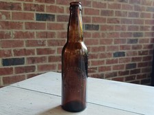 Antique CONSUMERS BREWING CO. Newark OHIO OH Early BEER BOTTLE Amber Embossed picture