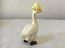 VINTAGE PORCELAIN GOOSE FIGURINE W/ YELLOW HAT / SMALLS 1 1/2'' X 2 1/2'' picture