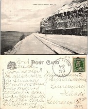 Alton Illinois lovers leap in winter to Postcard Used (42212) picture