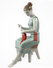 Vintage Hollohaza porcelain a woman sitting on a stool stringing paprika peppers picture