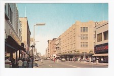 A View Of Main Street Facing North Springfield MA Storefronts Chrome Postcard  picture