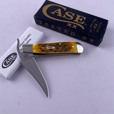 Case xx RussLock Peach Seed Jig Amber Bone Handle 00260 Folding Pocket Knife picture