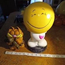Vintage 1971 Play Pal Happy Face Bank And 1978 Garfield Plastic Coin Banks picture