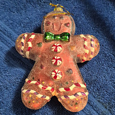 6-inch Art Glass Snowman With Candy Cain Strips And Green Bow. picture