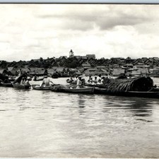 c1940s Iquitos, Peru Amazon River RPPC Wooden Boats Floating Village Huts Foto picture