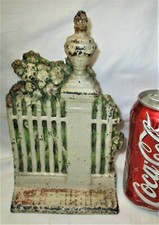 ANTIQUE SARAH W. SYMONDS SALEM MASSACHUSETTS CAST IRON FENCE WITCH HOME DOORSTOP picture