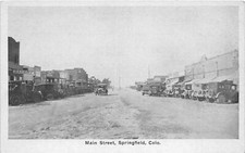 H60/ Springfield Colorado Postcard c1920 Main Street Stores Automobiles 4 picture