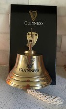 GUINNESS brass bar bell picture