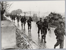 A02 A0205 – WWII Battle of the Ardennes, US Infantry Marching to Bastogne 1944 picture