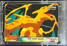 Charizard 1999 Topps Pokémon First Movie #35 The Fight Rages First Print picture