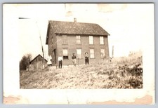 Old Homestead a Family Portrait in Front of Their Two-Story Farmhouse RPPC picture