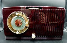 General Electric 515 Maroon Swirl Clock Radio 1950 picture