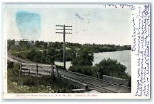 1906 Scene On Rock River C & N W Ry Man On Railway Janesville Wisconsin Postcard picture