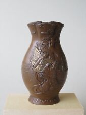 OLD JAPANESE METAL VASE WITH EMBOSSED FIGUES IN A FANTASY SETTING picture