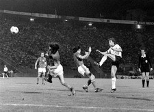 The German striker Dieter Muller volleys front CSSR defenders Anton- Old Photo picture