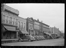 Photo:Main Street Storefronts Cars 1930s Downtown Commercial Street Scene picture