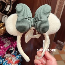 Disney authentic Winter Minnie Mouse white Ear Headband green bow disneyland picture