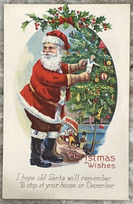 Christmas Wishes Santa Claus Hanging Gifts on Tree Litho DB Postcard C747 picture