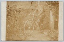 Vintage RPPC Real Photo Man With Early Bicycle c1910 Postcard picture