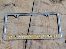 1960s Oldsmobile Indianapolis IN Collins Dealer Metal License Plate Frame Olds picture