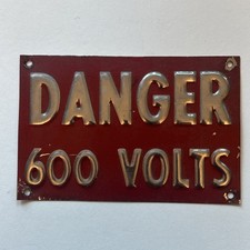 Vintage Bronze locomotive danger 600 volt sign 3in X 4.5in picture