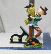 Autumn Fall Deco Scarecrow holding Bundle of Hay Figurine with crow Hat Resin picture