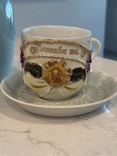 Antique Germán “Remember Me”  Tea Cup and Saucer C. 1900 Raised Floral picture
