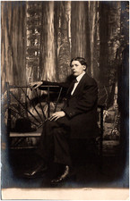 Serious Dapper Man Sitting on Bench in Suit Studio Photo 1900s RPPC Postcard picture