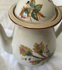 Steubenville Pitcher STB401.  Lid.  Some Aging. Beautiful Designs. 9.” picture