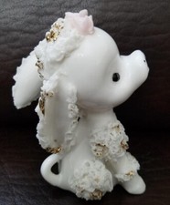 Spaghetti Poodle Figurine with Gold Trim and Pink Flowers on the Head picture