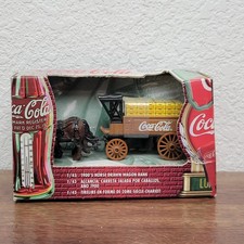 1999 Coca-Cola Die Cast Metal 1900's Horse Drawn Wagon Bank. Unopened picture