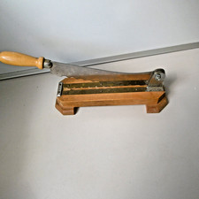 old dwarf bread cutter stainless steel wood picture