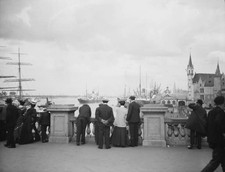 Travel views of Europe 1900s Group of people watching ships in a p- Old Photo picture