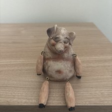 Chubby Smiling Dangling Limb Pig Decor picture