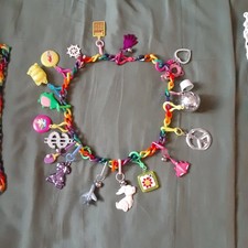 BELL CHARM NECKLACE w/ 19 CHARMS  all different also extra chains NEVER USED picture