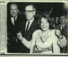 1966 Press Photo Pilot Jerrie Mock, supported by husband, Russell, arrives in OH picture