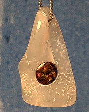Carved pendant; Polka dot agate inlaid with fire agate cabochon picture