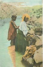 PANAMA CANAL NATIVES WASHING CLOTHES IN CANAL 1909 POSTCARD picture